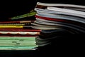 Heap of fallen notebooks on a table Royalty Free Stock Photo