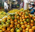 Heap of farm fresh Oranges kept for sale in a Indian fruit market Royalty Free Stock Photo