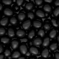Heap of farm raw organic black chicken eggs, abstract background