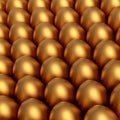 Heap of farm raw organic gold chicken eggs, abstract background