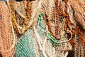 Heap of fishing nets and anchor chains sun-drying Royalty Free Stock Photo