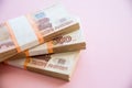 Heap of five thousand russian rubles banknotes.batch of 5000 Russian rubles notes, over pink background.Copy space.Many Royalty Free Stock Photo