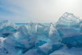 Heap of fragments of broken blue ice