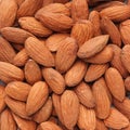 Heap of fresh almonds background texture closeup Royalty Free Stock Photo