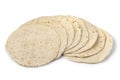 Heap of fresh baked tortilla close up on white background