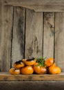 Heap of fresh brown and yellow tomatoes. Tomatoes Alices Dream on the old wooden table Royalty Free Stock Photo