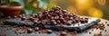 Heap of fresh coffee beans on slate with ground powder and star anise outdoors Royalty Free Stock Photo