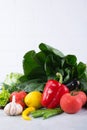 Heap of fresh fruits and vegetables on wooden background.