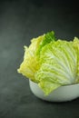 Heap fresh of green chopped iceberg lettuce in bowl