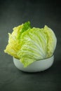 Heap fresh of green chopped iceberg lettuce in bowl