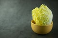 Heap fresh of green chopped iceberg lettuce in yellow bowl Royalty Free Stock Photo