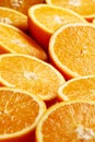 Heap of fresh halved orange slices Royalty Free Stock Photo