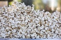 Heap of fresh made popcorn in machine
