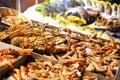 Heap of fresh raw shrimp on the counter of the fish market