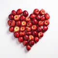 Heap fresh red apples be arrange in heart shape.