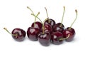 Heap of fresh red ripe juicy cherries close up on white background