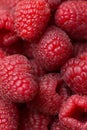 Heap of Fresh Ripe Vibrant Red Raspberries. Macro Photography. Top View Overhead Shot Visible Texture. Natural Food Background