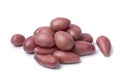 Heap of fresh small Roseval potatoes close up on white background