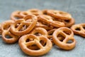 Heap of fresh Wheat salt pretzels on hessian linen Royalty Free Stock Photo