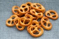 Heap of fresh Wheat salt pretzels on hessian linen Royalty Free Stock Photo