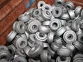 Heap of gear blanks at the workshop. Manufacturing of cylindrical gears