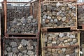 Wire baskets with natural stones on a construction site Royalty Free Stock Photo