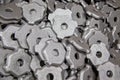 Heap of gray steel forgings after shot blasting - close-up natural heavy industrial pattern with selective focus Royalty Free Stock Photo