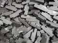 heap of gray steel forgings after shot blasting - close-up natural heavy industrial pattern with selective focus Royalty Free Stock Photo