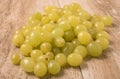 Heap of green grapes on wooden background, Royalty Free Stock Photo