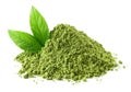 Heap of green matcha tea powder and leaves