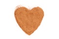 Heap of ground Cinnamon isolated in heart shape Royalty Free Stock Photo