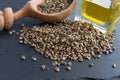 A heap of hemp seeds on the black stone background Royalty Free Stock Photo