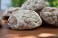 Heap of honey-cake on wooden table. Russian spice-cakes with frosting. Closeup