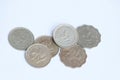 Heap of Hong Kong dollar coin money on white background. Concept of finance