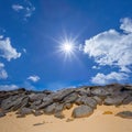 Heap of huge stones in sandy desert