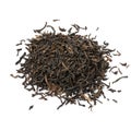 Heap of Indian Assam black Harmutty dried tea leaves close up on white background Royalty Free Stock Photo