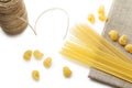 Heap of italian macaroni shells and spaghetti on the organic bag Royalty Free Stock Photo