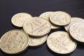 Heap of lithuanian coins on black background