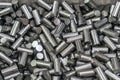 The  heap of machined material rod in the container box . Royalty Free Stock Photo