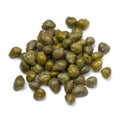 Heap of marinated capers close up on white background Royalty Free Stock Photo