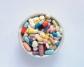 Heap of medicine pills and capsules on a white background Royalty Free Stock Photo