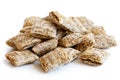 Heap of mini shredded wholegrain biscuits. Royalty Free Stock Photo