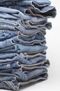 Heap of modern designer blue jeans