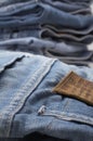 Heap of modern designer blue jeans