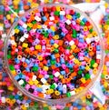 Heap of multicolor plastic beads Royalty Free Stock Photo