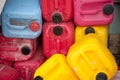 Heap of multicolored plastic canisters