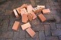 Heap of new bricks on old bricks floor background