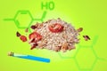 A heap of oatmeal and dried fruits against the background of a fictitious non-existing chemical formula