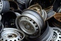 A heap of old rusty metal wheel rims Royalty Free Stock Photo