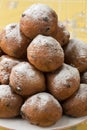Heap of oliebollen on a dish, traditional Dutch pastry for New Y Royalty Free Stock Photo